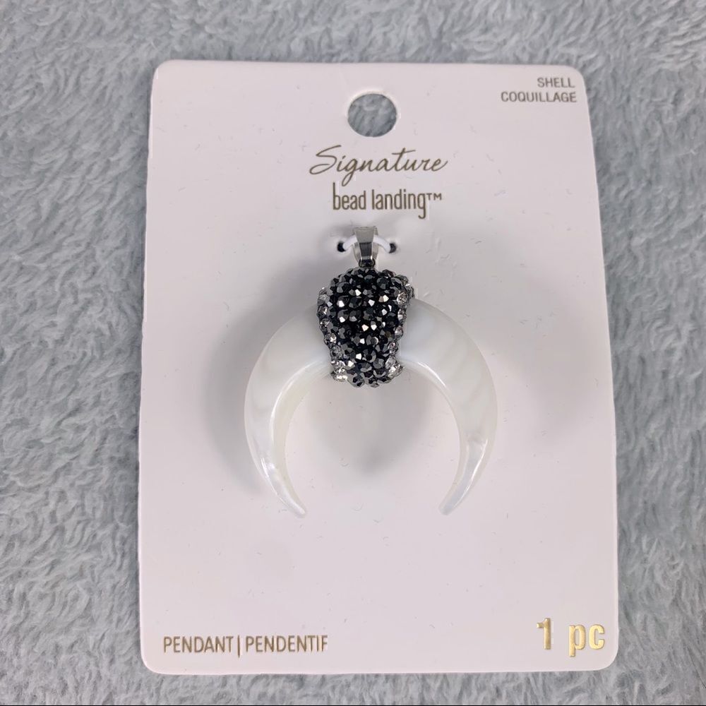 Michaels signature bead landing shell horn pendant